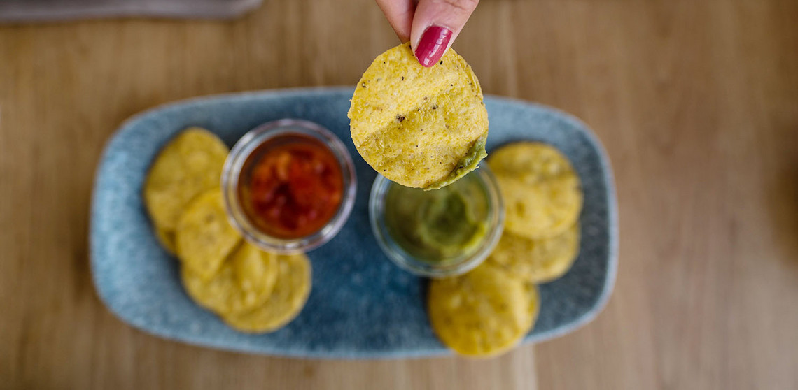 Nachos with spicy and mild sauces