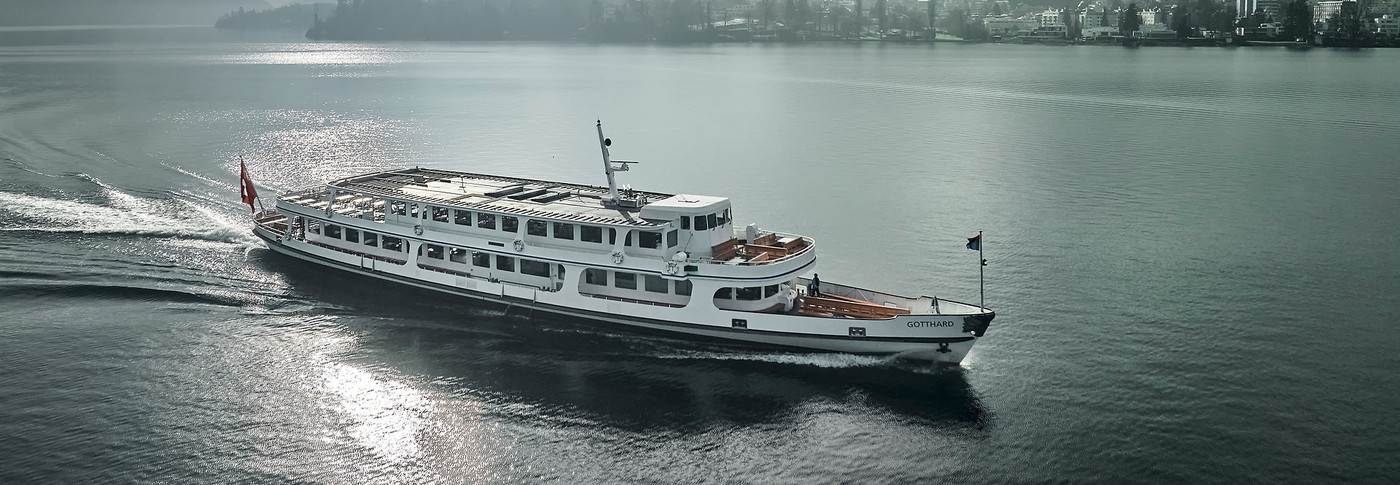 The motor vessel Gotthard sails on Lake Lucerne on a beautiful summer day.